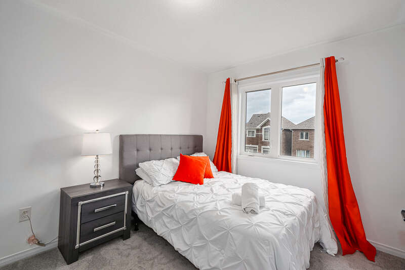 Bedroom with Red Accents